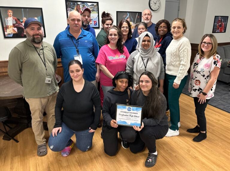 Binghamton High School staff stand with their "BOCES Kitchen of the Month" award